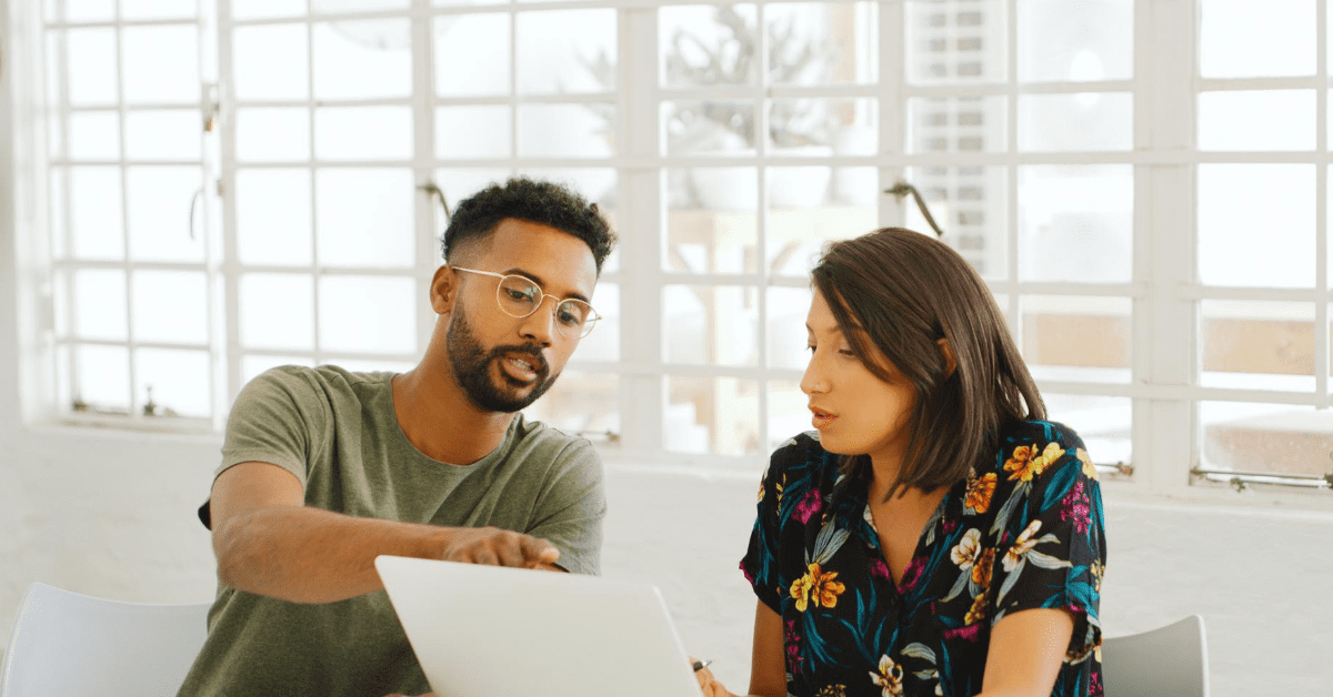 Managers discussing community platform