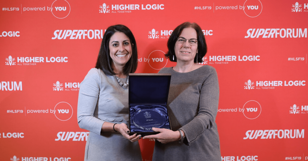 higher logic customers accept award at super forum