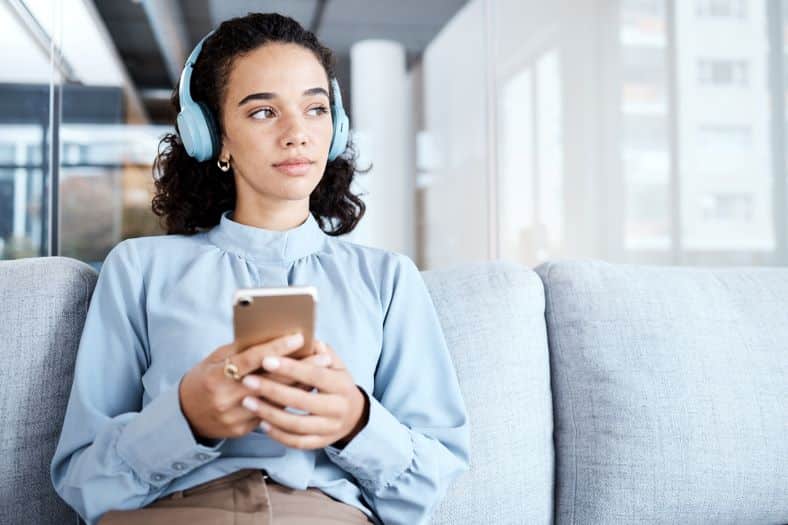 person listening to a podcast about associations