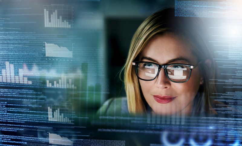 woman analyzing data and looking for data-driven insights with the help of AI