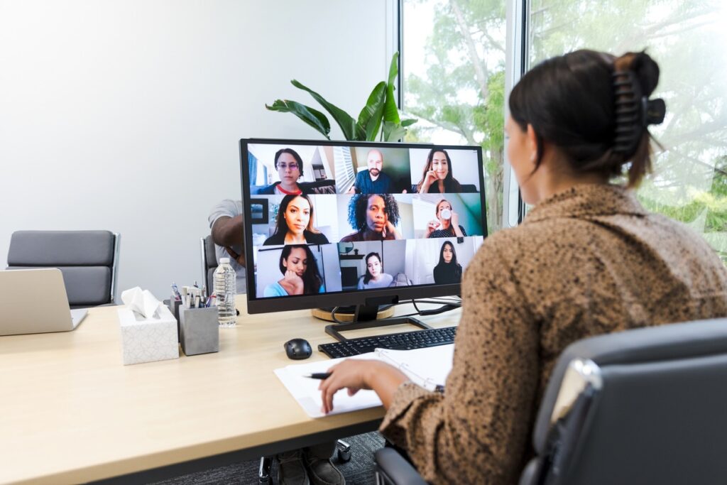 Virtual meeting connecting professionals through an online community, representing how an integrated LMS supports collaborative learning, discussion, and engagement in a unified digital experience