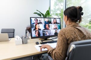 Virtual meeting connecting professionals through an online community, representing how an integrated LMS supports collaborative learning, discussion, and engagement in a unified digital experience