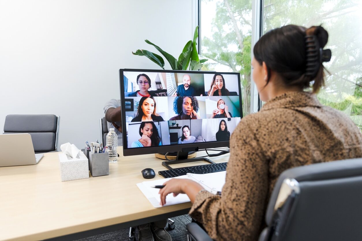 Virtual meeting connecting professionals through an online community, representing how an integrated LMS supports collaborative learning, discussion, and engagement in a unified digital experience