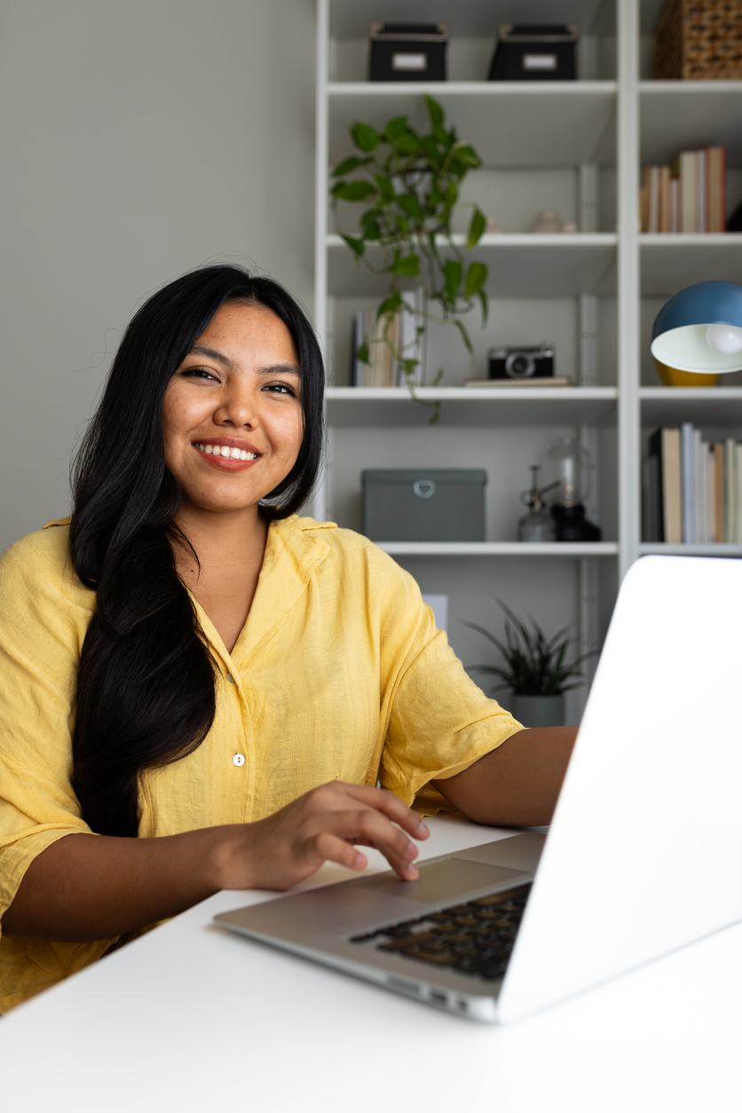 smiling woman showing up authentically at work
