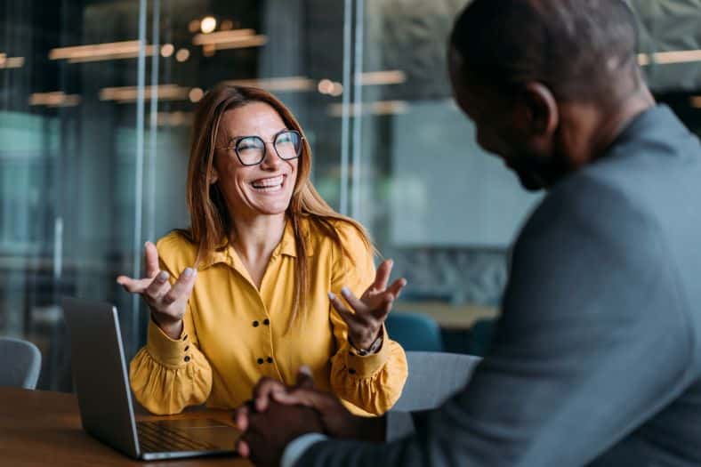 Community manager and community member discussing the community in meeting