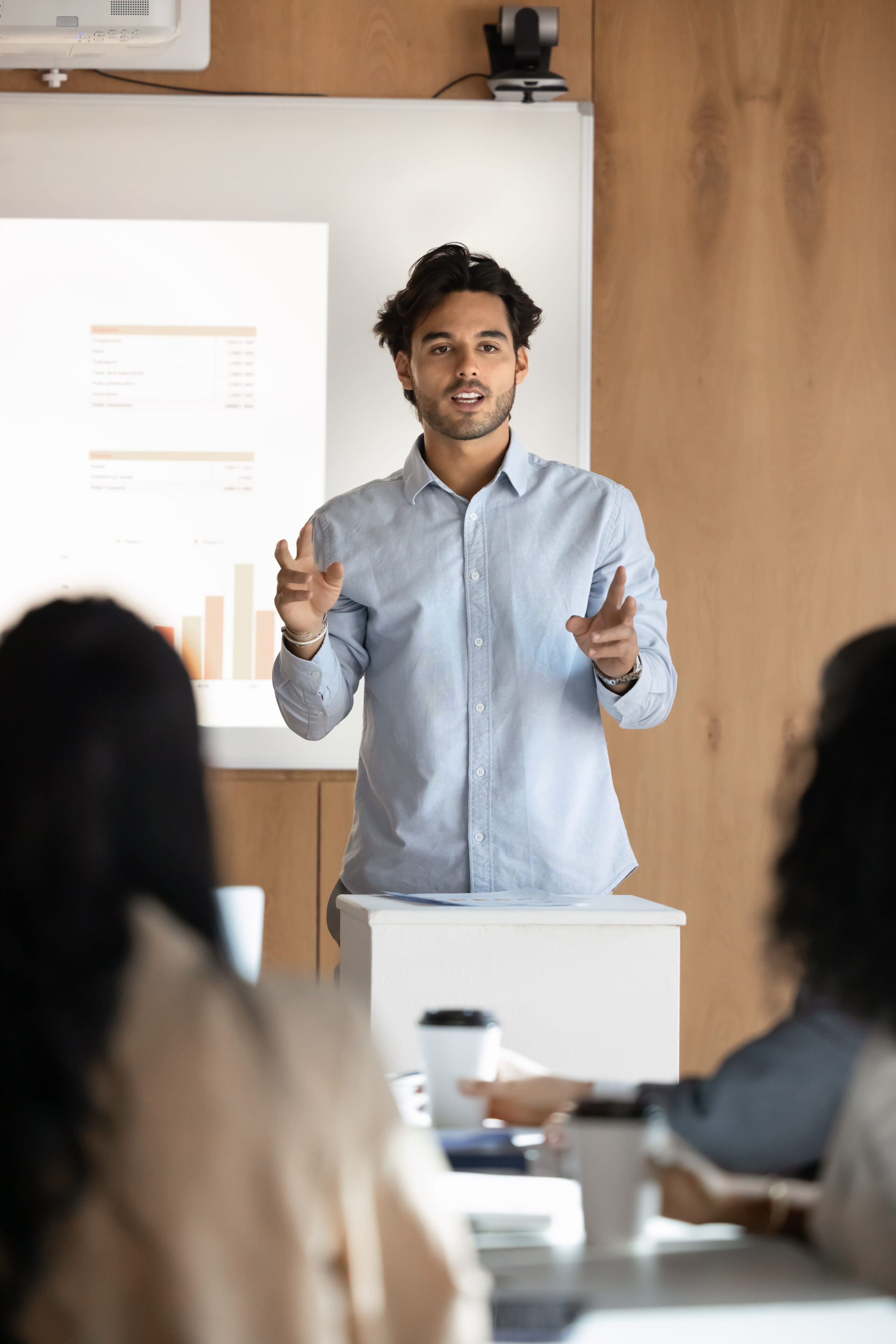 Man presenting to association board of directors to get approval for community software